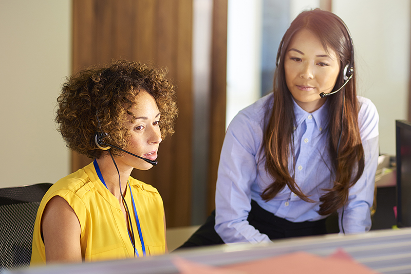 Office workes with headsets